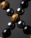 Bracciale tripla protezione ( Occhio di tigre, Ematite, Ossidiana ) 4 millimetri